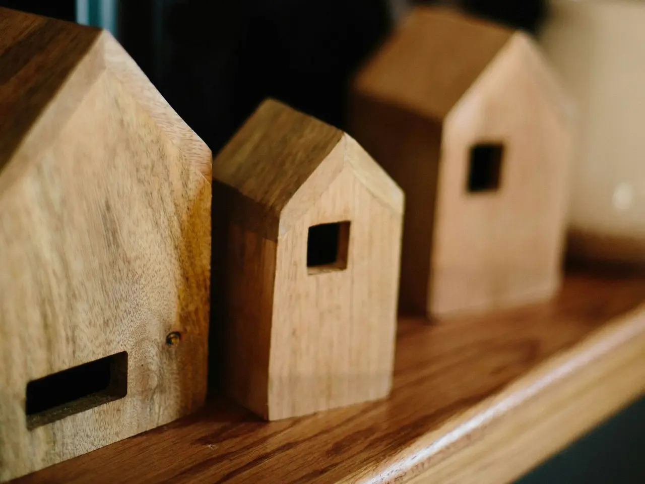 shallow focus photo of brown wooden house miniature